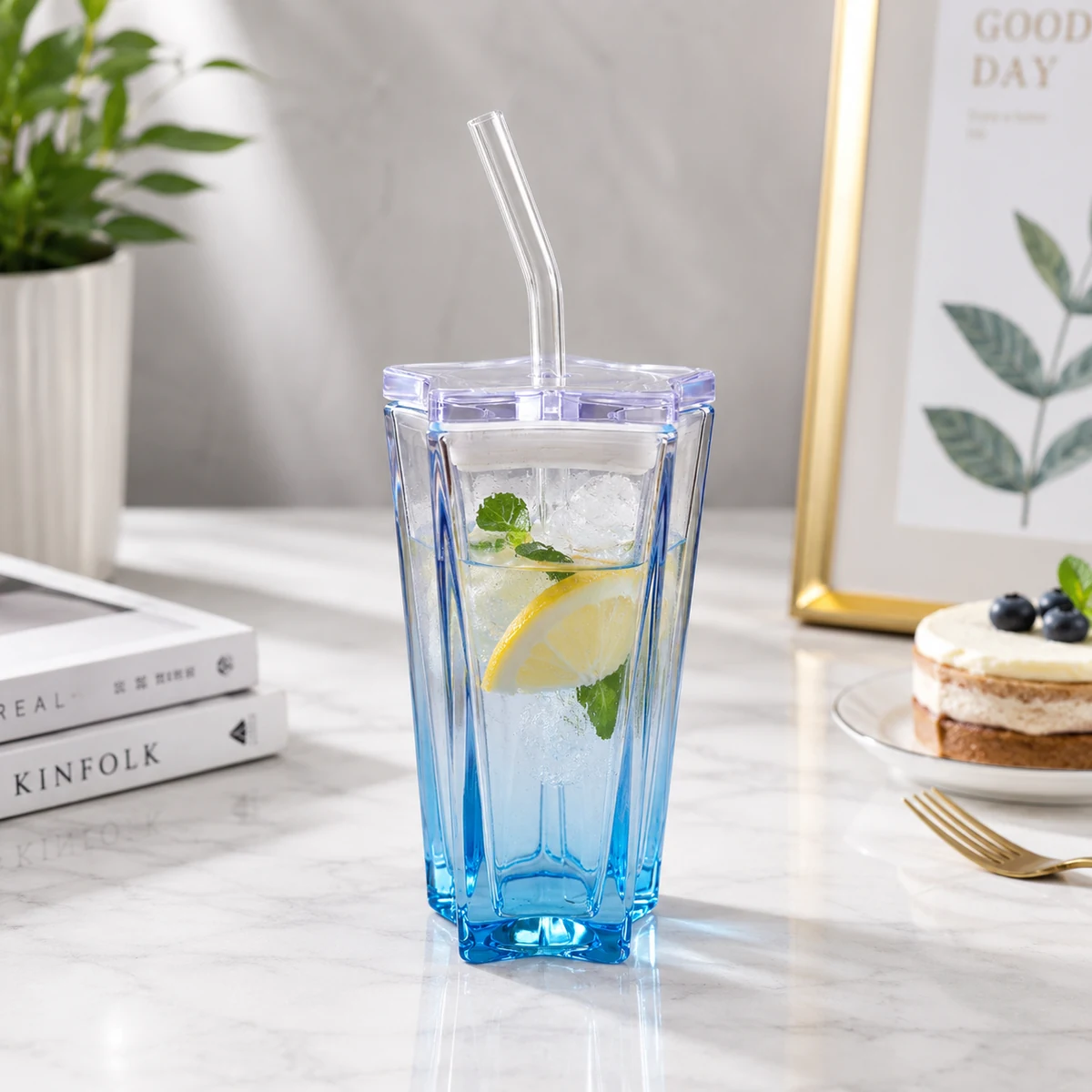 Gradient blue glass tumbler with straw and lid
